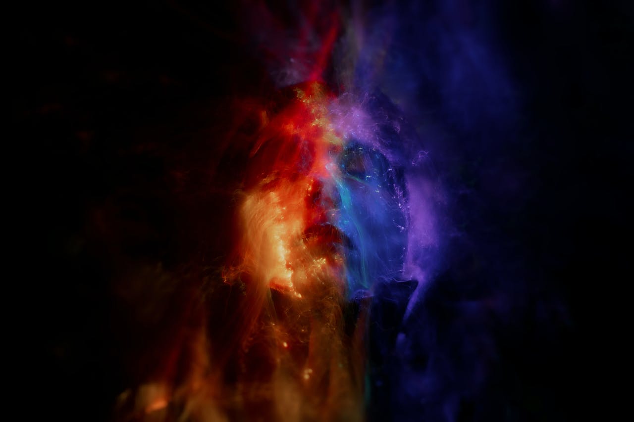gallery-1 Abstract vibrant image featuring glowing red, orange, and blue light waves, creating a dynamic and conceptual design.